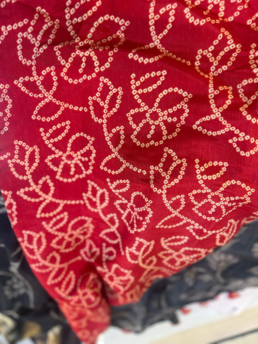 Red blouse with gold floral patterns 